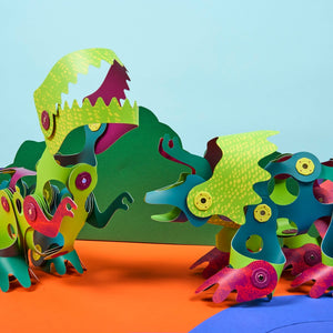 CLIXO magnetic building pieces in vibrant colors assembled into dinosaur shapes with flexible joints and snap connections
