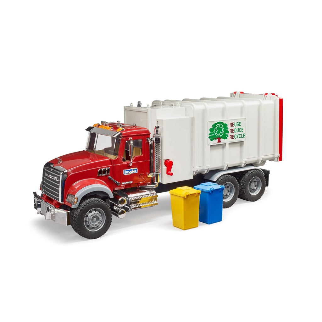 Red Bruder Mack garbage truck toy with white rear loader and small yellow and blue recycling bins